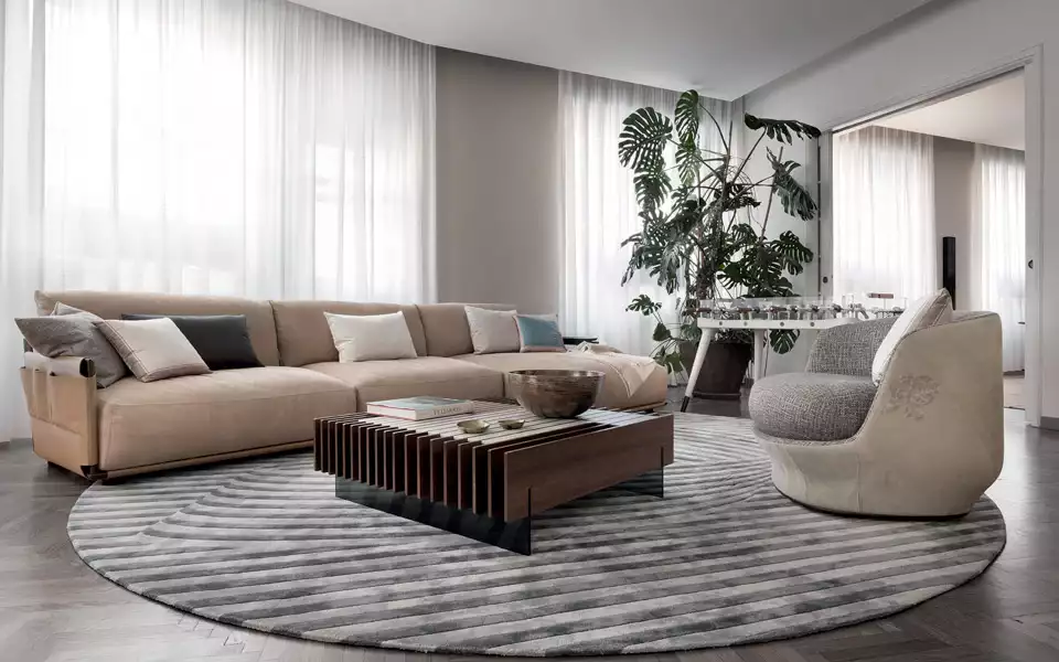 Spacious Living room design with cream sofa & grey rug -Beautiful Homes