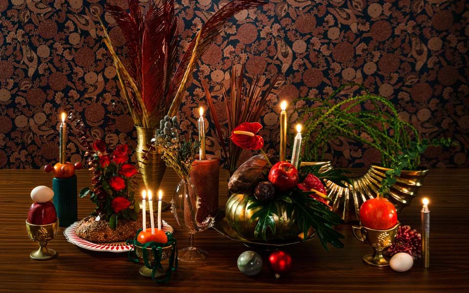 Christmas table creatively decorated with local botanicals