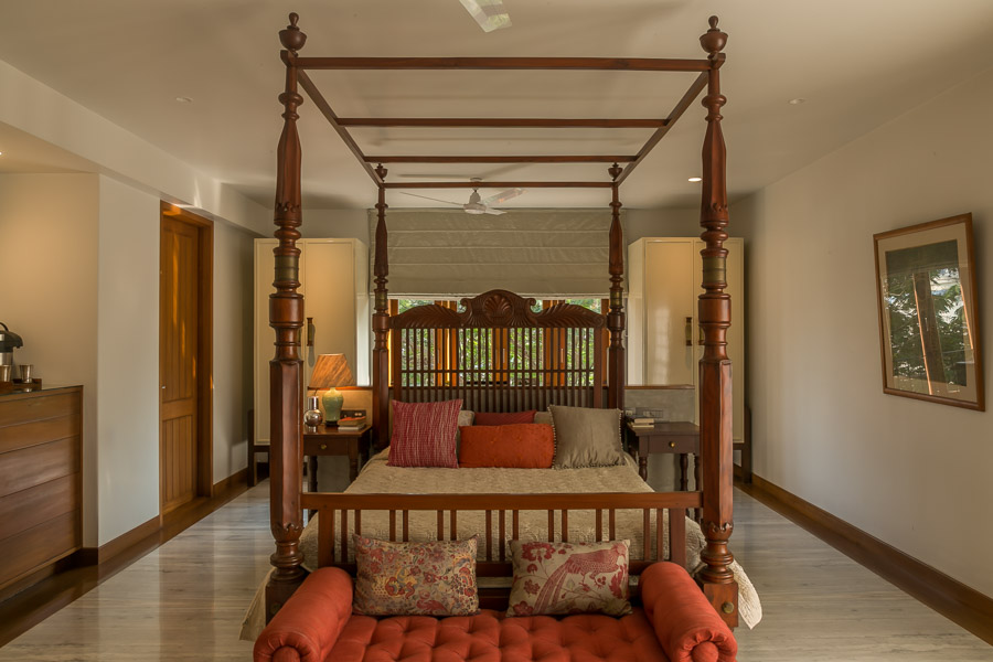 Indian bedroom design ideas obtained with gaddis, terracotta-coloured upholstery and print cushions - Beautiful Homes