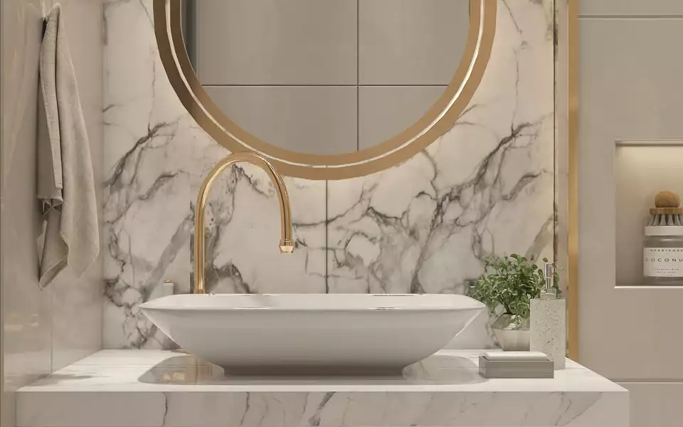 Wash basin design with gold metalling detailing, white marble, matching mirror frame and tap