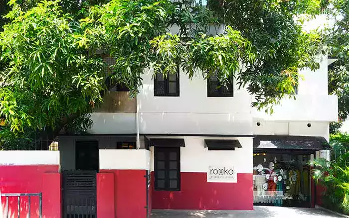 Contemporary Kerala House outside view painted red and white