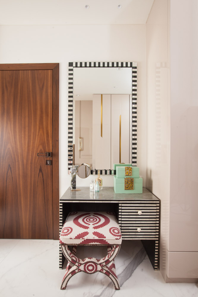 Cute corner dressing table in striped pattern with pops of bedroom colours - Beautiful Homes