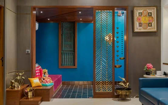 Space Saving Pooja Room Design With an Idol, Wind Chines &amp; Bells Hung  - Beautiful Homes