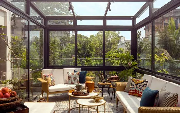 Glass roof as skylight in living rooms extended for terrace apartments - Beautiful Homes