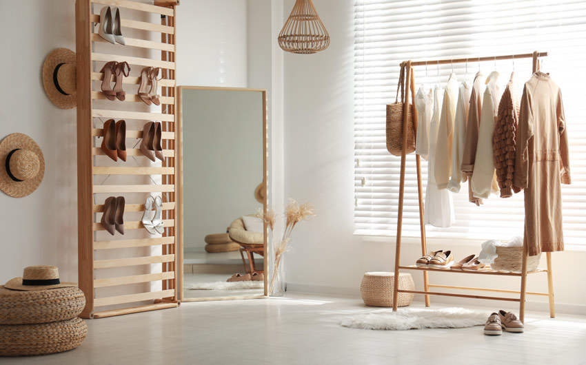 An old wooden frame that has been repurposed as a shoe rack - Beautiful Homes