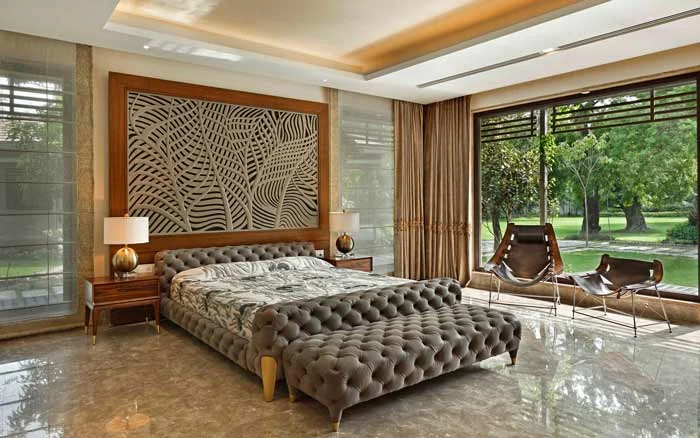 Modern bedroom design with bed that has a tufted upholstery finish matching with bedroom d&eacute;cor - Beautiful Homes