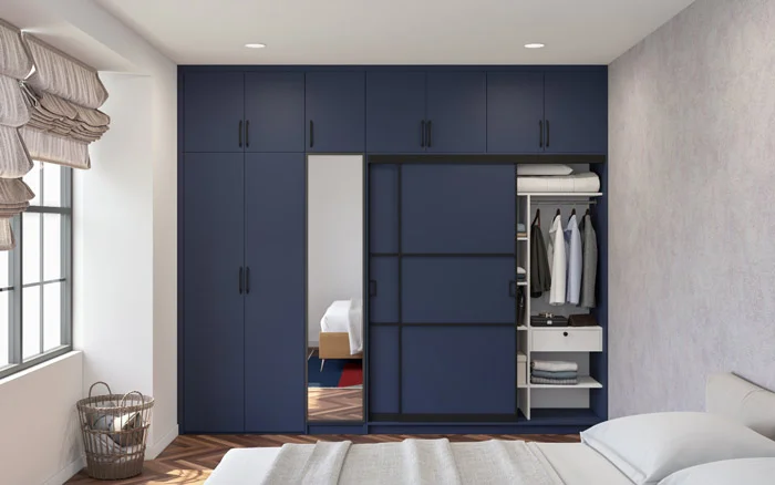 Customised sleek wardrobe design with matte colour finish that fits to a wall - Beautiful Homes