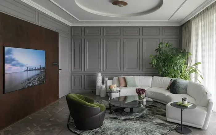 Living room floor tile design with herringbone pattern &amp; straight line mouldings on wall - Beautiful Homes