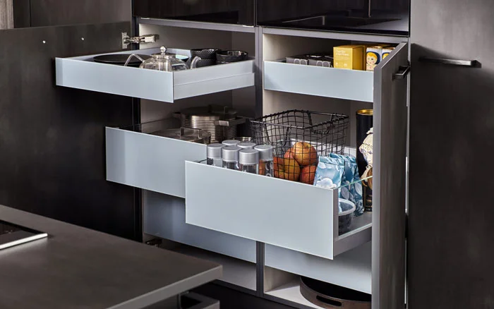 Kitchen drawer design enclosed in the kitchen cupboard for storage purpose - Beautiful Homes