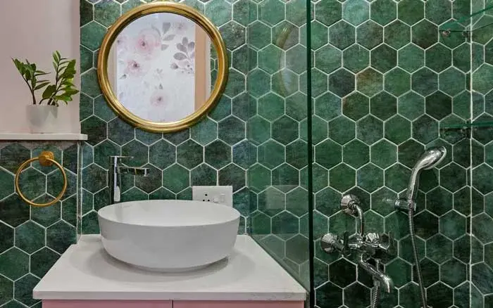 Bathroom interior with honeycomb shaped wall tiles & chic bathroom décor - Beautiful Homes