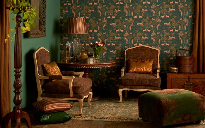 A green living room with a floral wallpaper