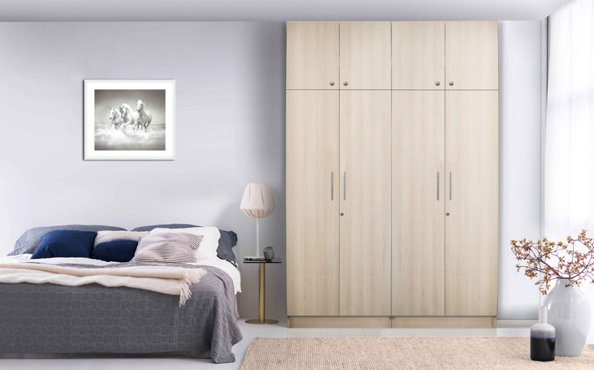 Two door wooden bedroom cupboard interior design for your bedroom interiors - Beautiful Homes