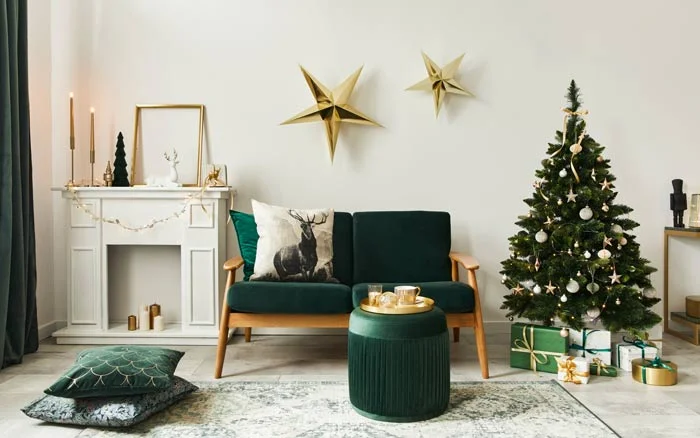 Living room with a green sofa and christmas decor