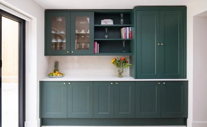 Small modular kitchen design with green kitchen cabinets - Beautiful Homes