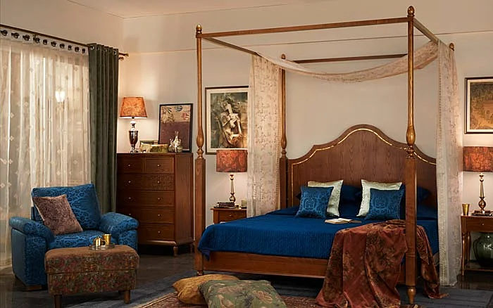 Bedroom with a wooden four poster bed