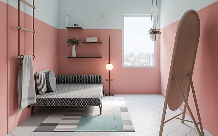 Pink room with a daybed and a lamp
