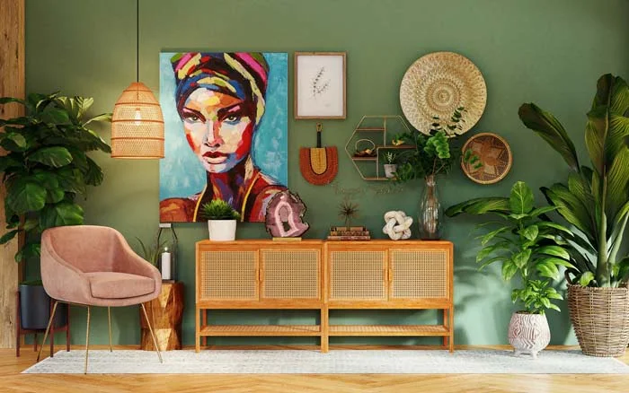A green room with a large painting and other colourful artefacts on the wall