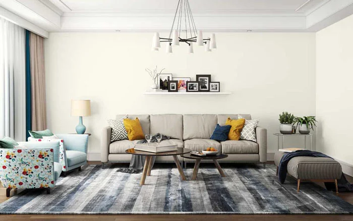 All white living room design with grey sofas &amp; comfortable chairs for sitting - Beautiful Homes