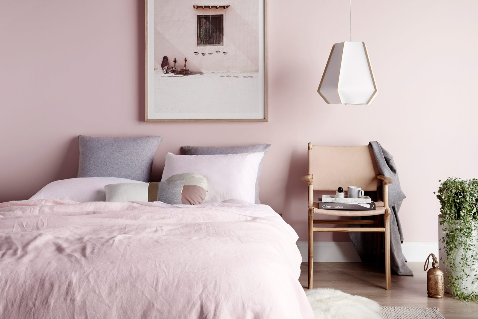 Minimalist Bedroom Design and Décor Ideas With Hanging Lamp and Peach Colour Wall Paint - Beautiful Homes
