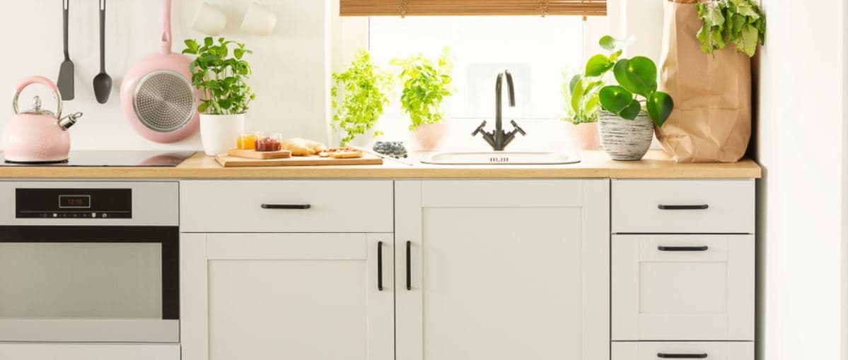 White Kitchen Interior Design With White Storage Shelves - Beautiful Homes